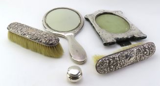 A collection of silver dresssing table related items