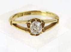 A gold old cushion cut diamond ring, marked ‘18ct’, t