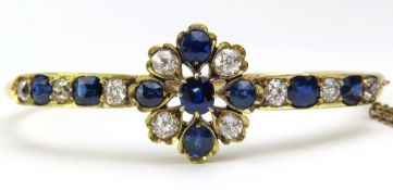 A Victorian diamond and sapphire hinged bangle