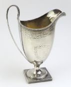A Georgian silver helmet shaped jug