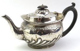 A Victorian silver teapot with ebonised handle