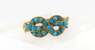 An unmarked turquoise set figure of eight shaped r