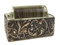 A silver and glass stamp roller, the body