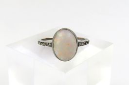 A 19th or early 20th century opal and diamond ring,