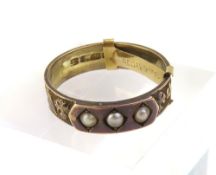 A 19th century 9ct gold pearl ring, the three pearls are set wi