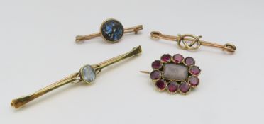 An unmarked 19th century mourning brooch, the central