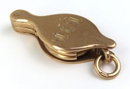 A pair of 9ct gold lorgnettes, two hinged eye piec