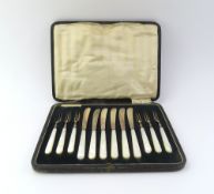 A cased set of silver fruit knives and forks