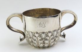 A silver loving cup with wide ogee handles