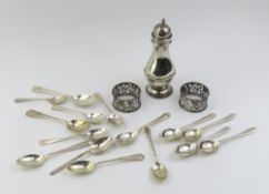 A collection of silver items, including a sugar shaker