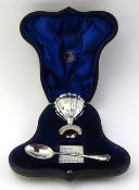 A cased silver egg cup with intermittent