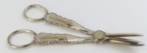 A cased silver pair of grape scissors
