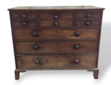 A mahogany chest of three long drawers