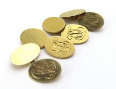 A pair of 18ct gold oval cufflinks, engraved with