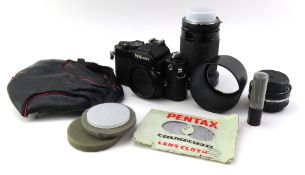 Nikon - a FM SLR camera with a Nikon 35mm single