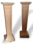 A pair of modern varnished light pine plinths, of