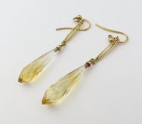 A pair of unmarked yellow metal drop earrings set