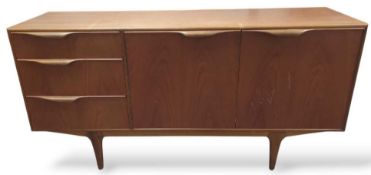 A wooden sideboard in the style of the mid century