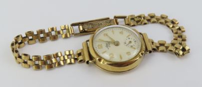 Avia – a 9ct gold ladies wristwatch, the round whi