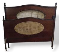 A mahogany headboard and footboard for a bed. The