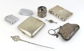 A collection of silver and other items, including