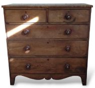 A mahogany chest of two short and three long drawers