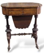 A small Victorian mahogany writing table in the fo