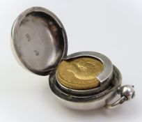 A 1911 King George V full sovereign, 8g gross; a 1