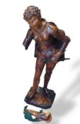A carved wood figure of Viola/Cesario from Shakesp
