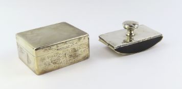 A silver cigarette box with wooden interior, along