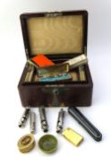 An amber coloured cheroot holder