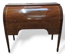 A drum top writing desk, stamped J T NEEDS