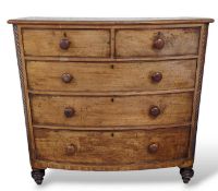 A light mahogany chest of drawers