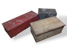 Two wooden boxes with hinged lids, alongside a pin