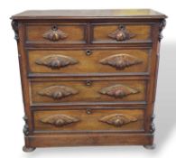 A mahogany chest of two short and three long drawers
