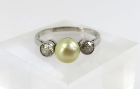 An old cut diamond and pearl ring, unmarked white