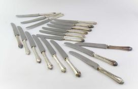 A set of eighteen Mappin and Webb silver handled table knives