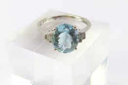 An 18ct white gold aquamarine and diamond dress ring