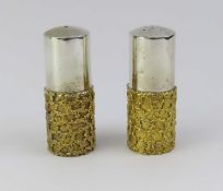 A pair of Stuart Devlin (Australian-British, 1931-2018) silver gilt cruet set