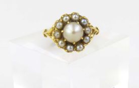 A late 19th or early 20th century pearl cluster ring