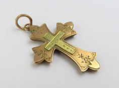 A two colour 9ct gold cross pendant