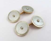 A pair of mother of pearl set cufflinks