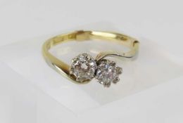 A two stone diamond twist ring