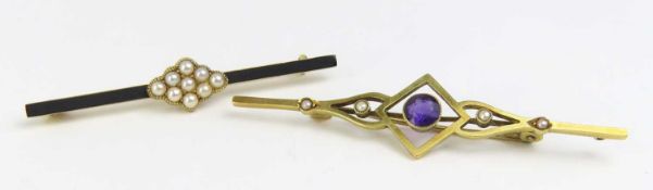 A pearl and black enamel mourning brooch