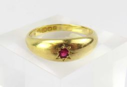 An 18ct gold gypsy style ring