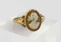 A partially marked rose metal oval cameo ring