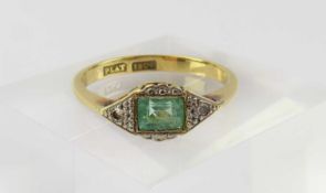 An early to mid-20th century emerald and diamond ring