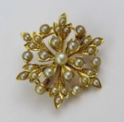A late 19th or 20th century split and seed pearl set pendant brooch