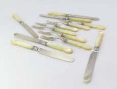 A set of Victorian silver fruit eaters