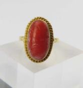 A coral set ring